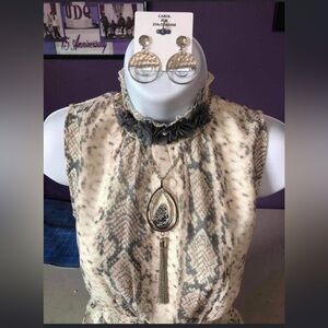 Adult small black and white tank style top with matching accessories.